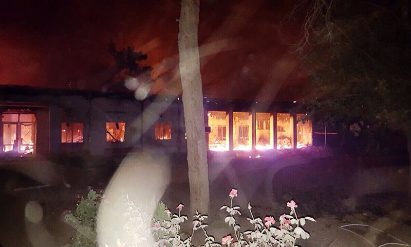 Fires burn in part of the MSF hospital in the Afghan city of Kunduz after it was hit by an air strike. — AFP