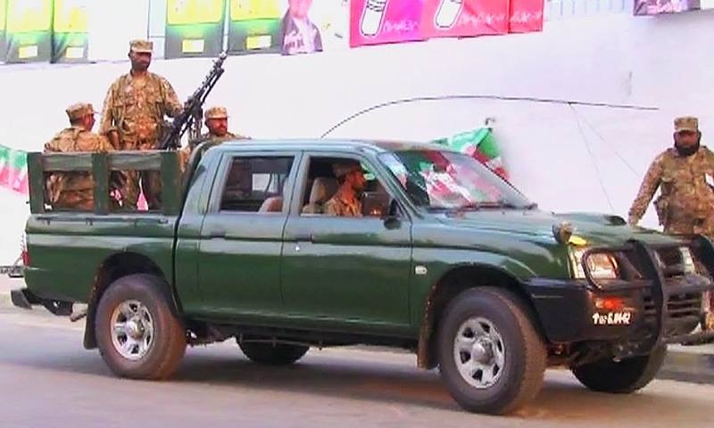 Security personnel have been deployed in Lahore and Okara to provide security at sensitive polling stations. ─ DawnNews screengrab.