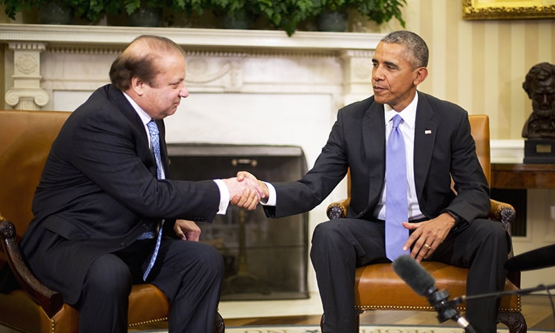 President Barack Obama shakes hands with Prime Minister Nawaz Sharif during their meeting in the Oval Office of the White House in Washington -AP