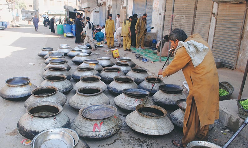 Degs of biryani and haleem lined up for niyaz