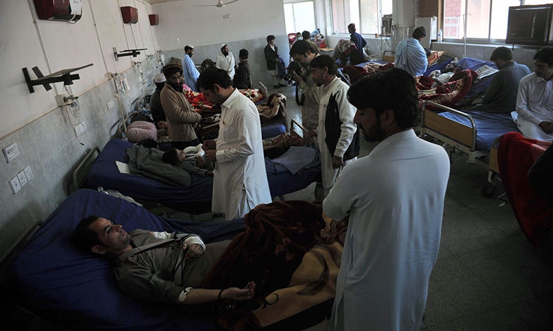 Injured Pakistanis are treated in a hospital following an earthquake in Peshawar on October 27, 2015. —AFP