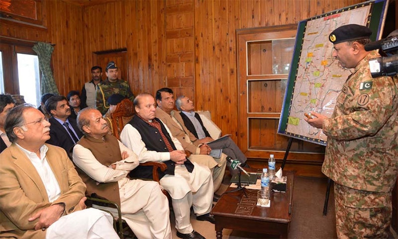 PM Nawaz attending a briefing about damages caused by earthquake in Shangla on October 27- photo PID