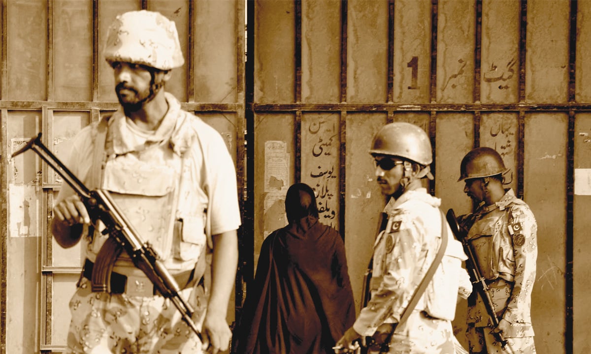 Rangers personnel stand alert to avert any untoward incident during an operation at Yousuf Plaza, Karachi| White Star