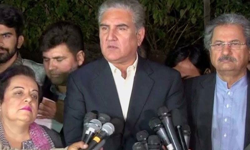 Shah Mahmood Qureshi speaking to media with Shafqat Mehmood on his side . ─DawnNews screengrab