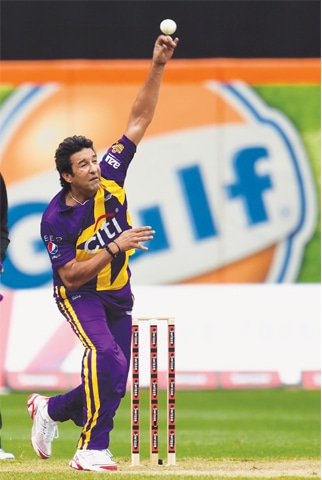 PAKISTAN pace legend Wasim Akram bowls for Warne’s Warriors.—AFP