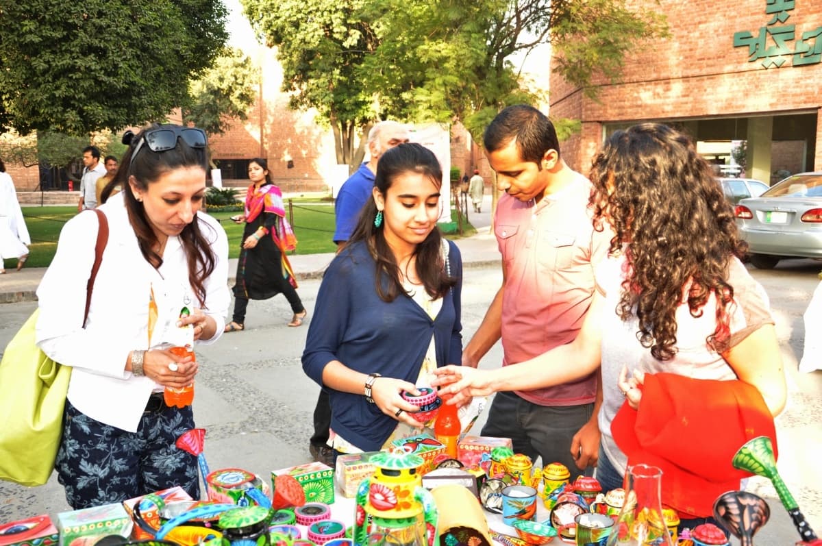 Festival attendees check out the arts and crafts on sale – Publicity photo