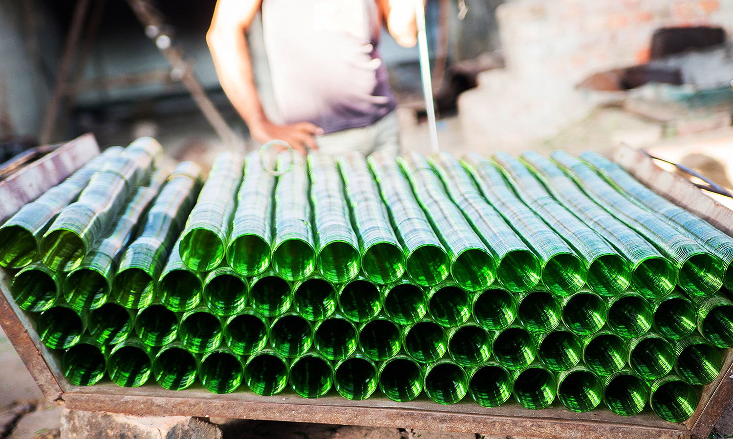 These rolls of bangles are made out of 7Up bottles!