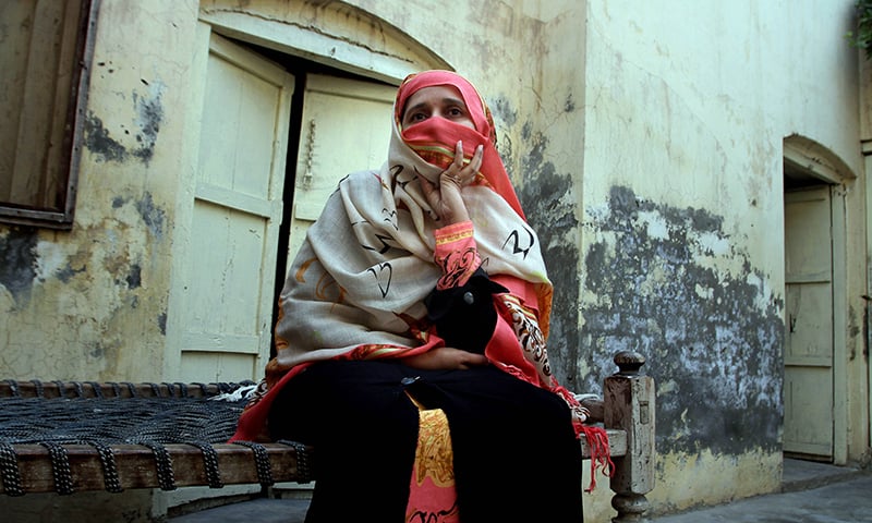 Hifza Batool, a relative of Tashfeen Malik, talks to The Associated Press at her home in the town of Karor Lal Esam. ─ AP