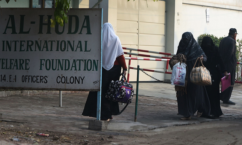 Students arrive at Al-Huda Institute, one of the most high-profile religious teaching centre for females, in Multan on December 7, 2015, where female US shooter Tashfeen Malik studied. — AFP