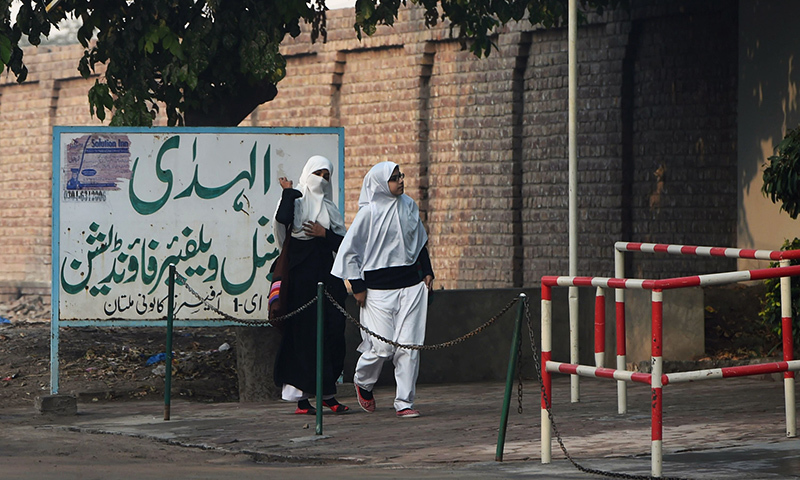 Students arrive at Al-Huda Institute, one of the most high-profile religious teaching centre for females, in Multan on December 7, 2015, where female US shooter Tashfeen Malik studied. — AFP