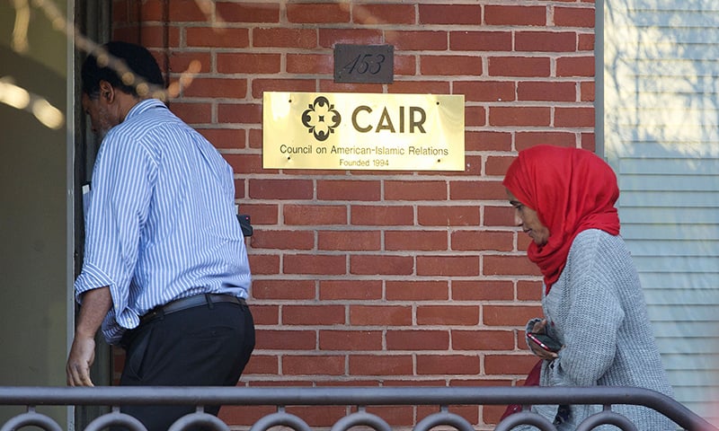 People return to the CAIR HQ. ─ AP