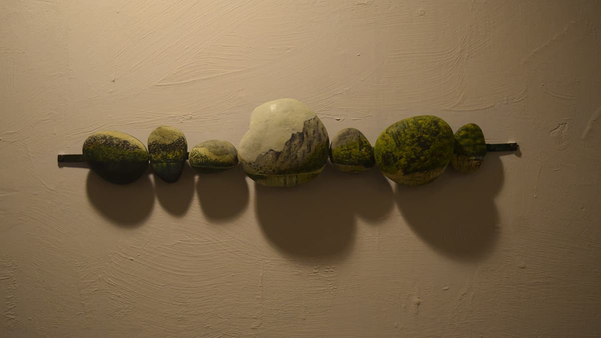 Landscape drawn on pebbles— Photo by author