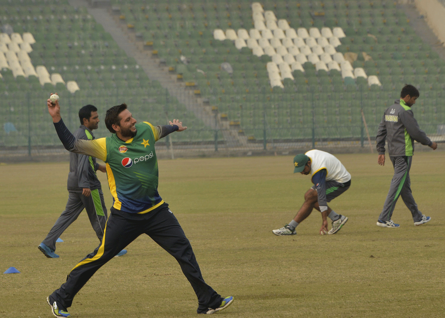 Flamboyant all-rounder Shahid Afridi testing his throw. — AFP