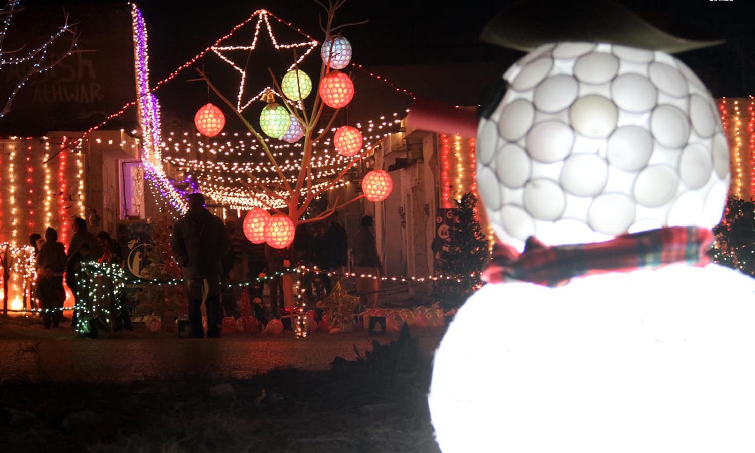 An illumined view of Christian locality in Islamabad, decorated with colorful light on the eve of Christmas. &mdash;INP