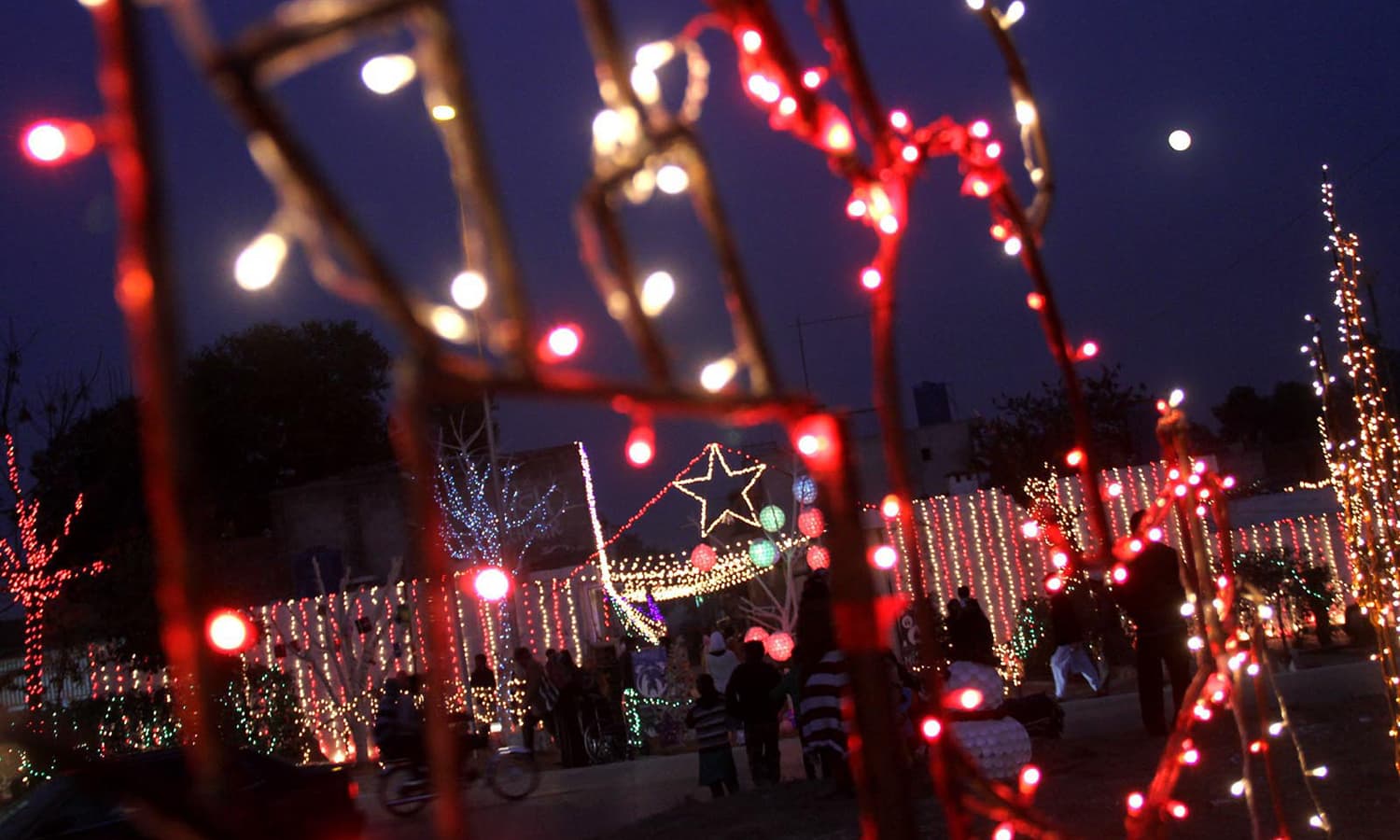 An illumined view of Christian locality in Islamabad, decorated with colorful light on the eve of Christmas. &mdash;INP