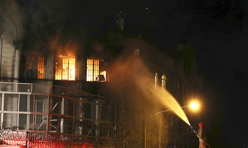 Firefighters extinguishing the fire at the Saudi Embassy in Tehran after Iranian protesters held a demonstration at the location. ─ Reuters