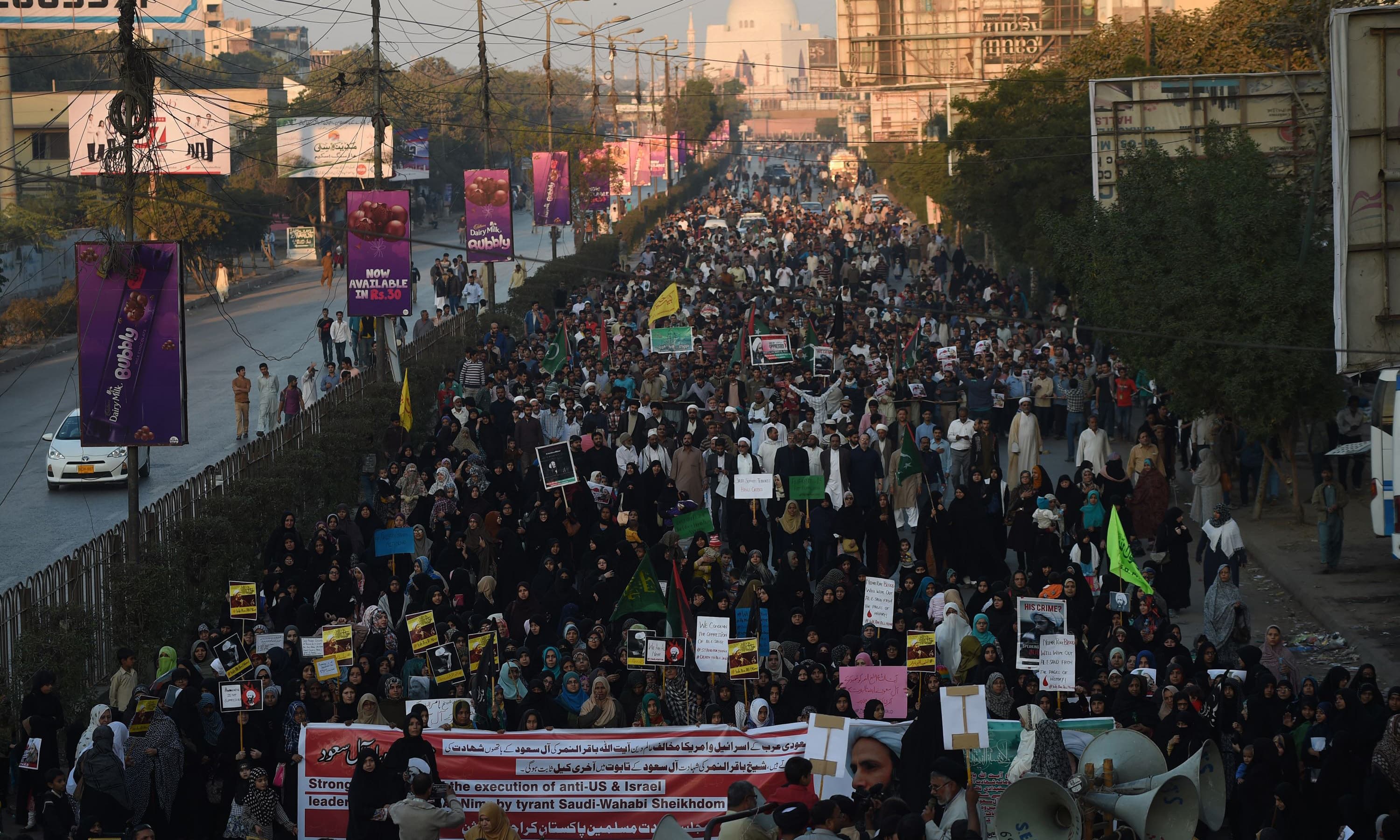 People take part in a rally to condemn the execution of Shia cleric Sheikh Nimr al-Nimr. —AFP