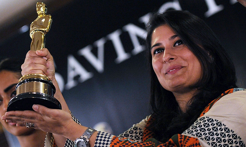 In this file photograph taken on March 10, 2012, Oscar-winning Pakistani director Sharmeen Obaid-Chinoy poses for a photograph with the award during a press conference in Karachi.—AFP