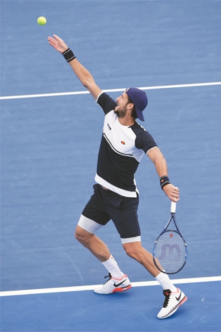 MELBOURNE: Feliciano Lopez of Spain serves to Belgium&rsquo;s David Goffin during the Kooyong Classic final on Friday.&mdash;AFP