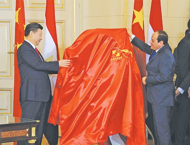 Cairo: Egyptian President Abdel Fattah al-Sisi and Chinese President Xi Jinping unveil an emblem on development projects in Suez Canal area during their meeting on Thursday.—Reuters
