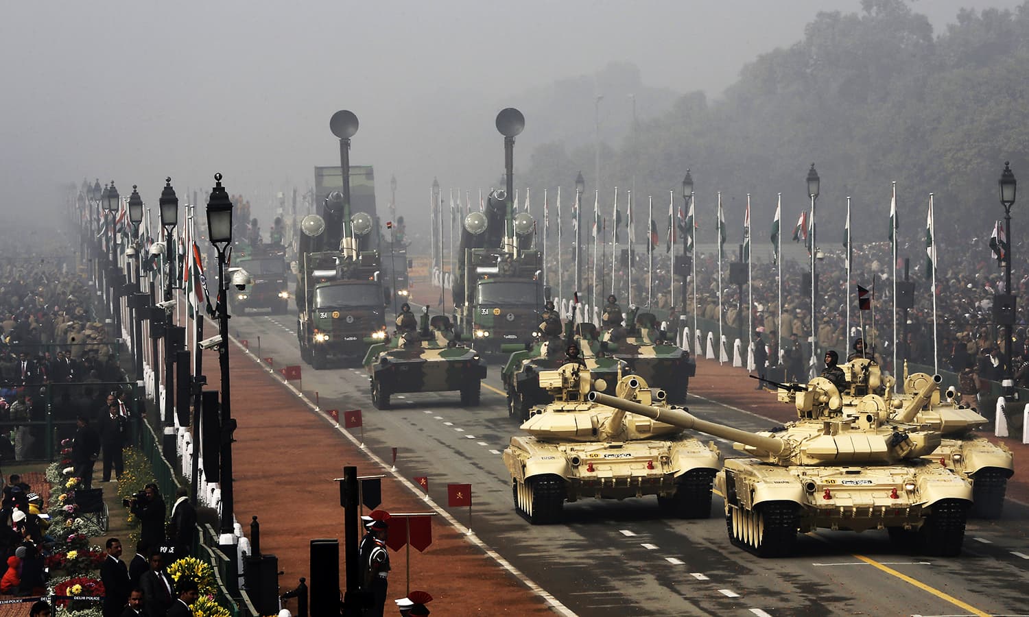 Indian Army's T-90 Bhishma tanks (front) are displayed during the Republic Day parade. ─ Reuters