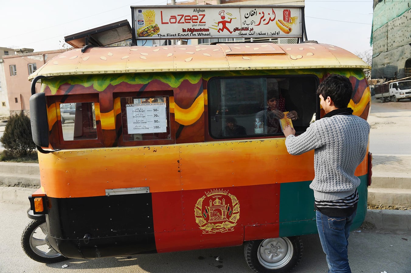 Hot dogs from Karachi With relish, Kabul's middle class embraces the