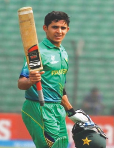 FATULLAH: Pakistan wicket-keeper/batsman Umair Masood raises the bat after reaching his century in the ICC Under-19 World Cup quarter-final against West Indies at the Khan Shaheb Osman Ali Stadium on Monday.&mdash;Courtesy ICC