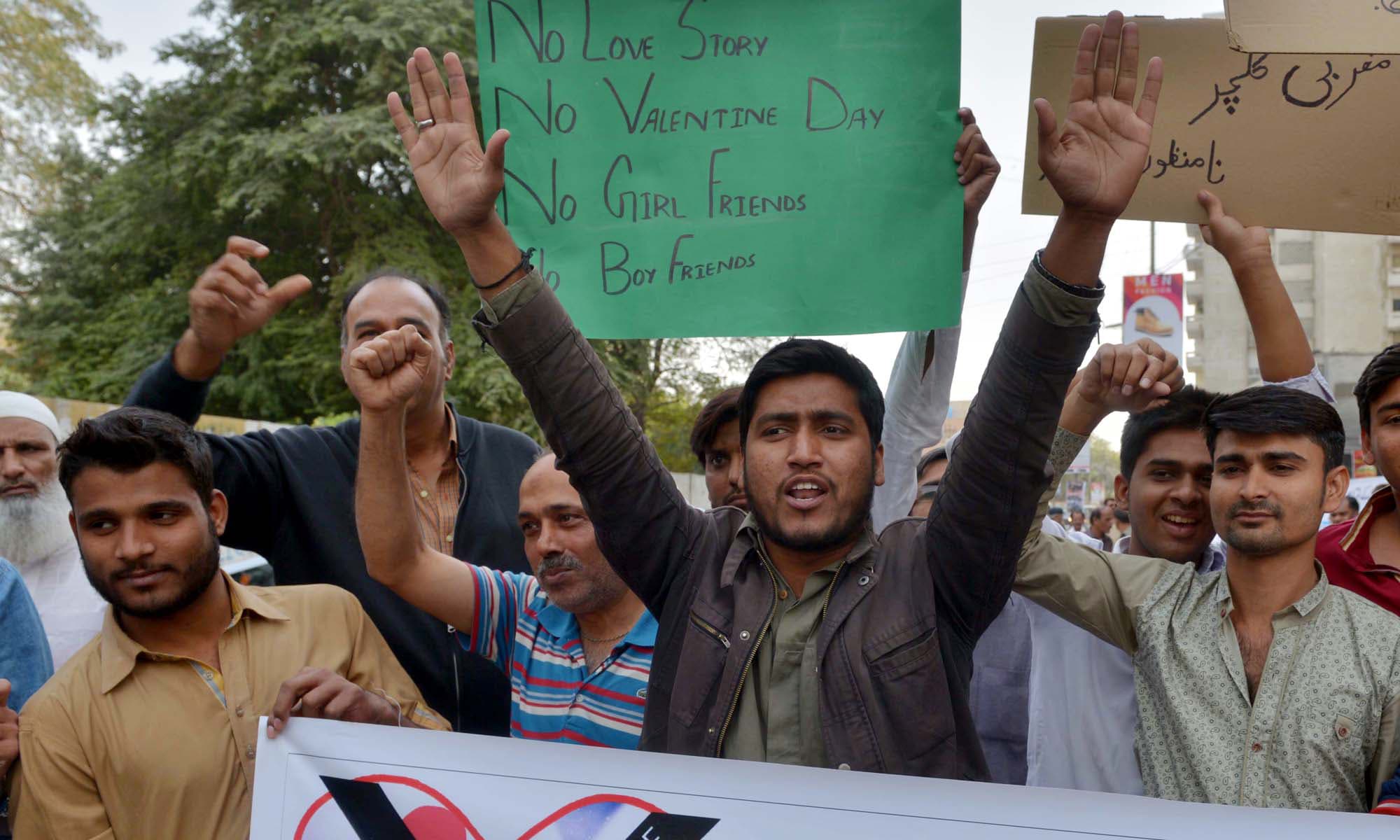 Students chant slogans against valentine celebrations 
during protest in Karachi. —PPI