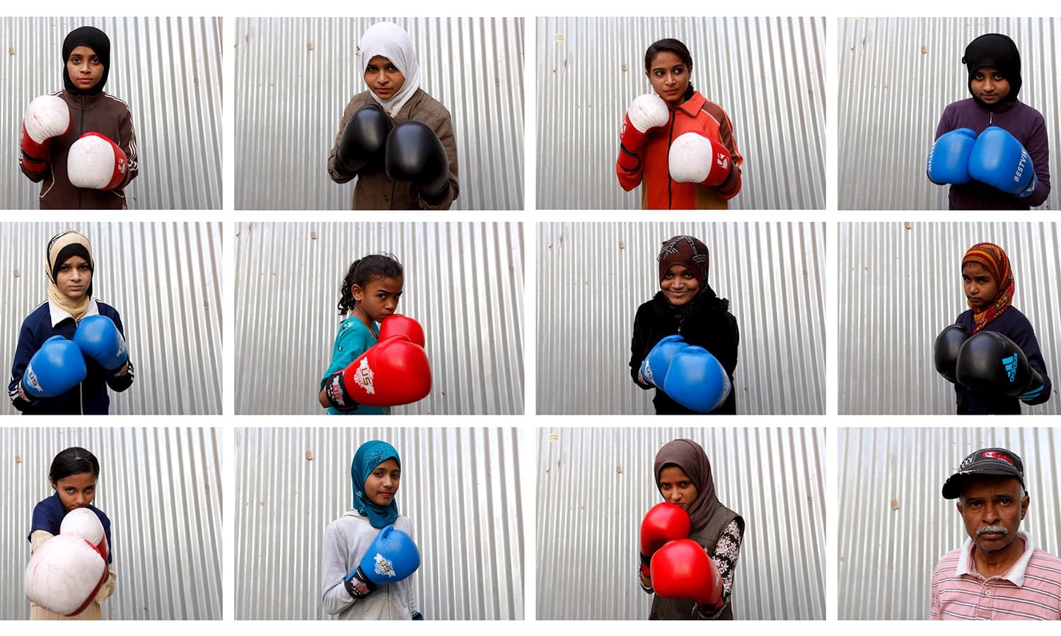 Students of coach Younus Qambrani posing with their boxing gloves at the first women's boxing coaching camp in Pak Shaheen Boxing Club in Lyari.— Reuters