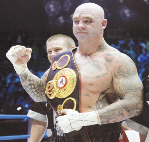 LUCAS Browne celebrates his victory over Ruslan Chagaev.&mdash;AP