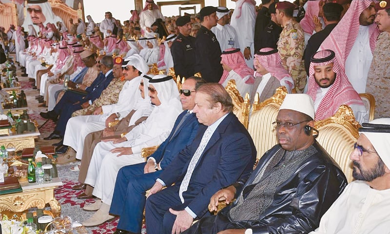 RIYADH: Prime Minister Nawaz Sharif, King Salman bin Abdul Aziz and leaders of other countries witness the closing moments of  the ‘North Thunder’ military exercises on Thursday.—INP