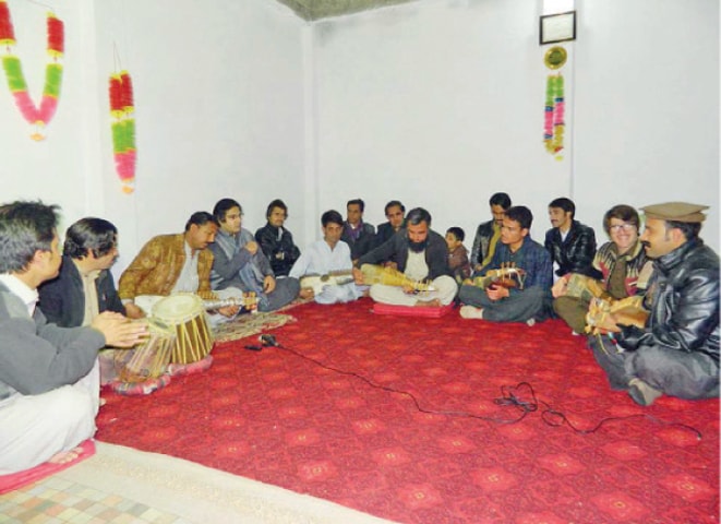 A rabab learning class underway in Mingora. &mdash; Dawn