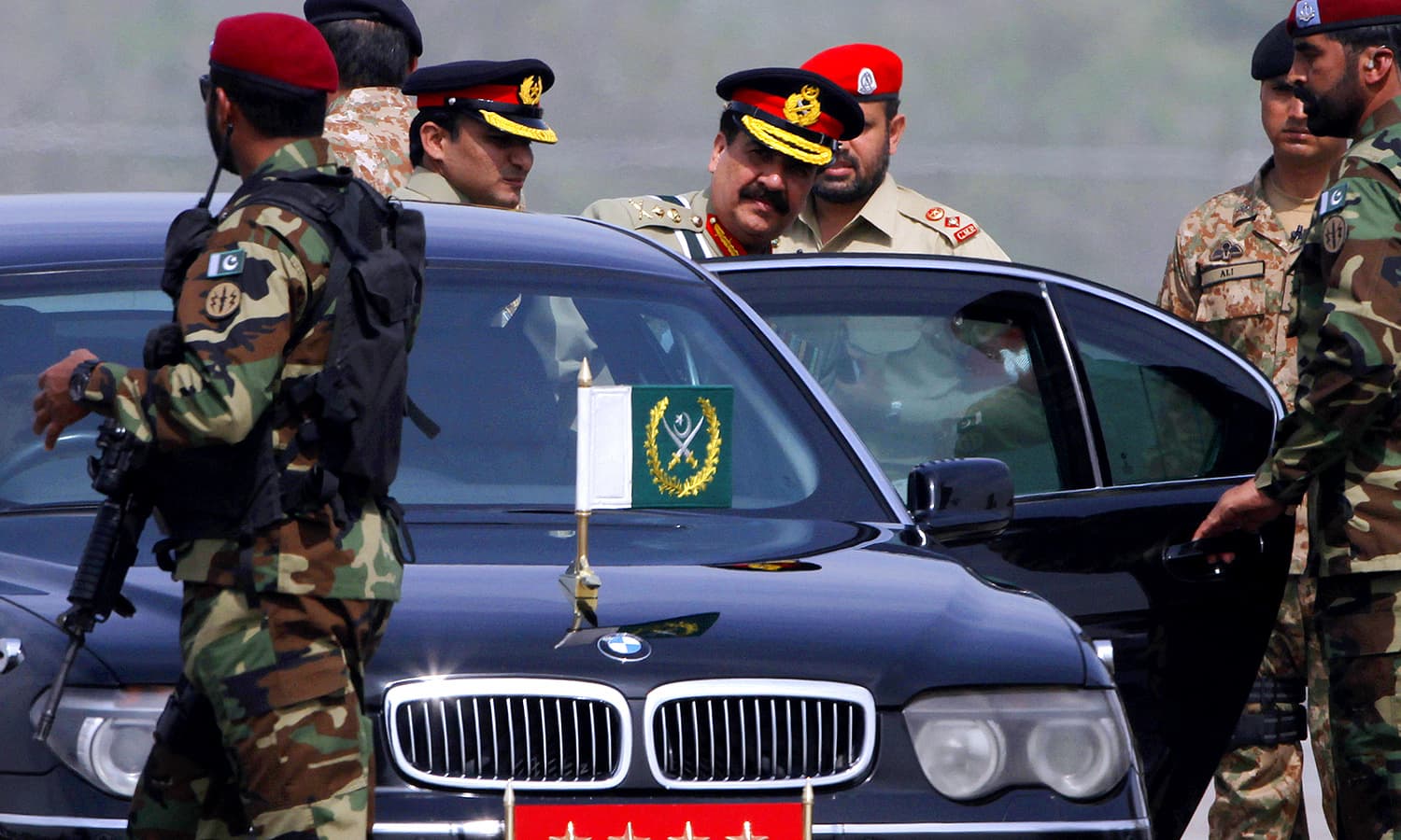 Army Chief General Raheel Sharif leaves after attending the Pakistan Day military parade. ─ AP