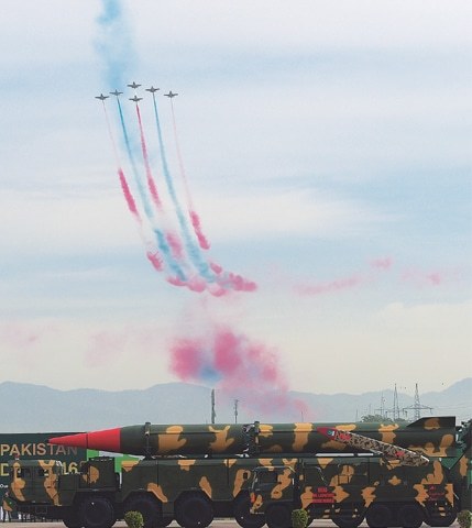 ISLAMABAD: Jets fly over a long-range ballistic Shaheen III missile during the Pakistan Day parade.