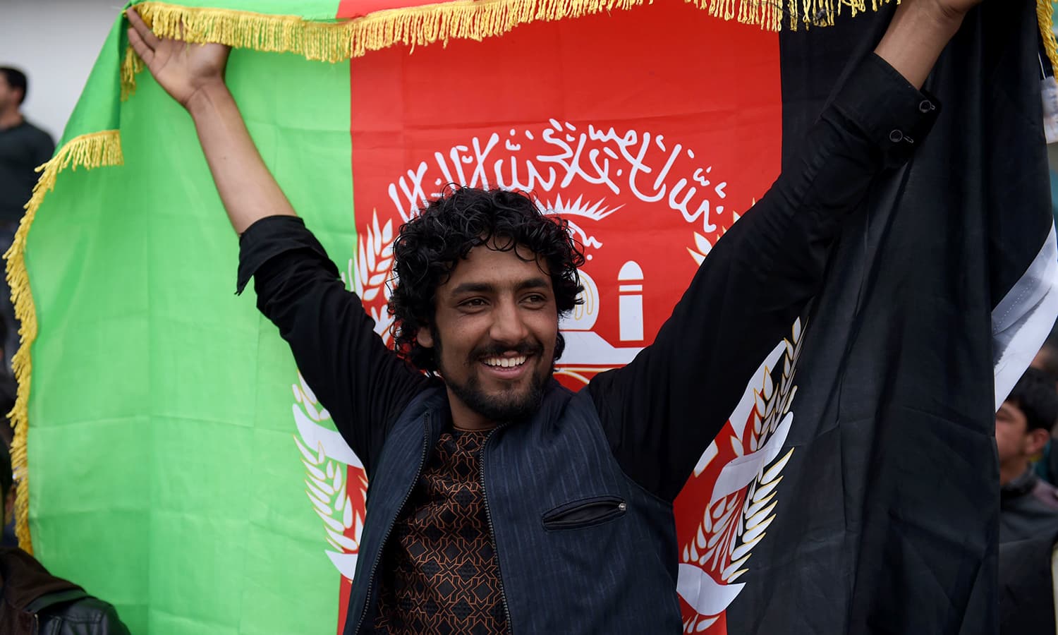 Hundreds of Afghan cricket fans welcomed the national cricket team home at the airport in Kabul. — AFP