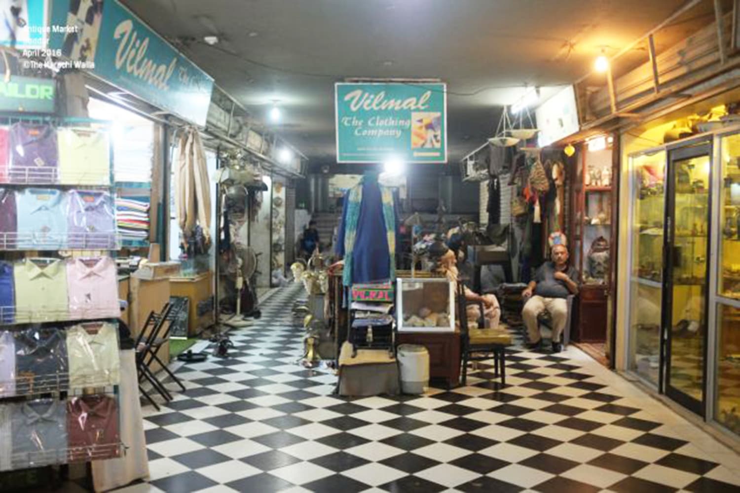 There is a old clothing shop inside the heart of the antique market.