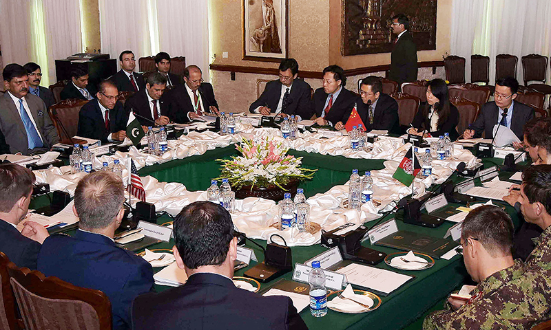 Foreign Secretary Aizaz Ahmad Chaudhry (centre L) chairs the fifth round of four-way peace talks with Afghanistan, US and Chinese delegates at the Foreign Ministry in Islamabad.─APP