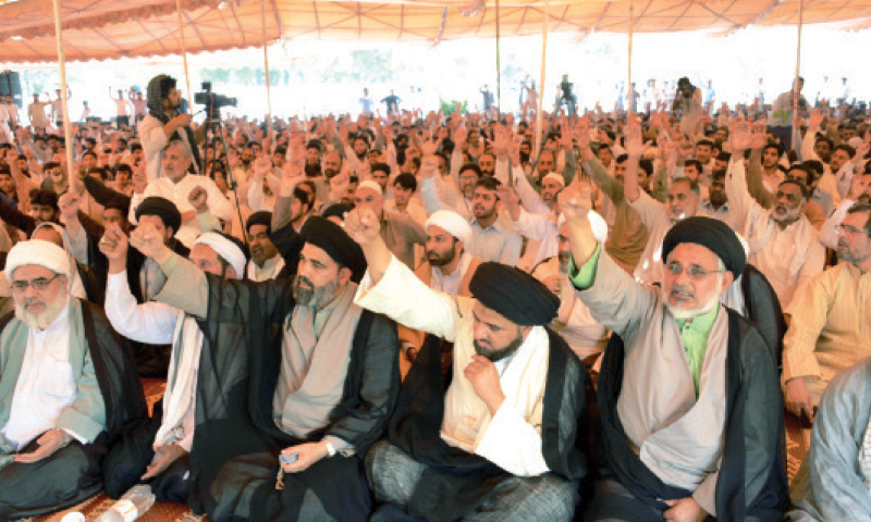 Participants raise slogans at the MWM hunger strike camp on Friday. — White Star