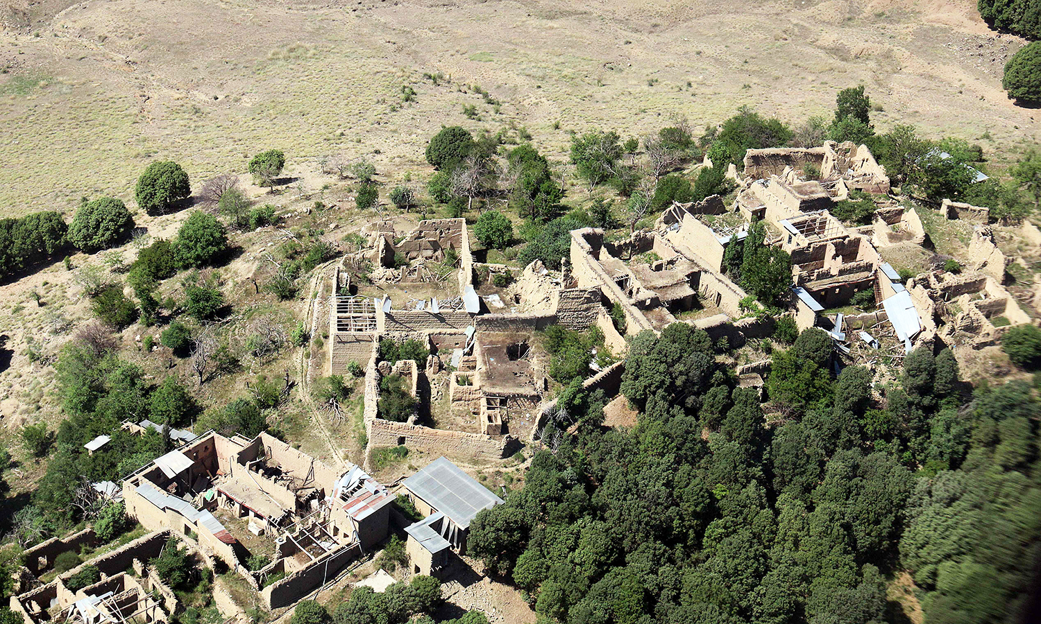 Empty houses whose roofs have been removed by the army during an operation seen in South Waziristan.— AFP