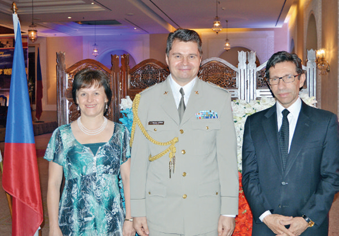 (R-L) Ambassador Jan F&uuml;ry, Col. Miroslav Kaspar and Mrs. Lydia Kasparova welcome guests at the Czech Armed Forces Day in Islamabad.
