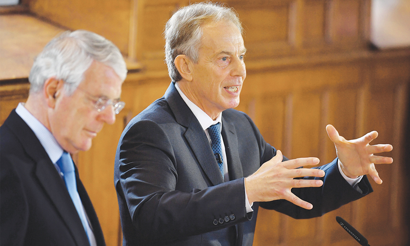 LONDONDERRY: Former British prime ministers John Major and Tony Blair share a platform for the Remain campaign at the University of Ulster in Northern Ireland on Thursday.—AP