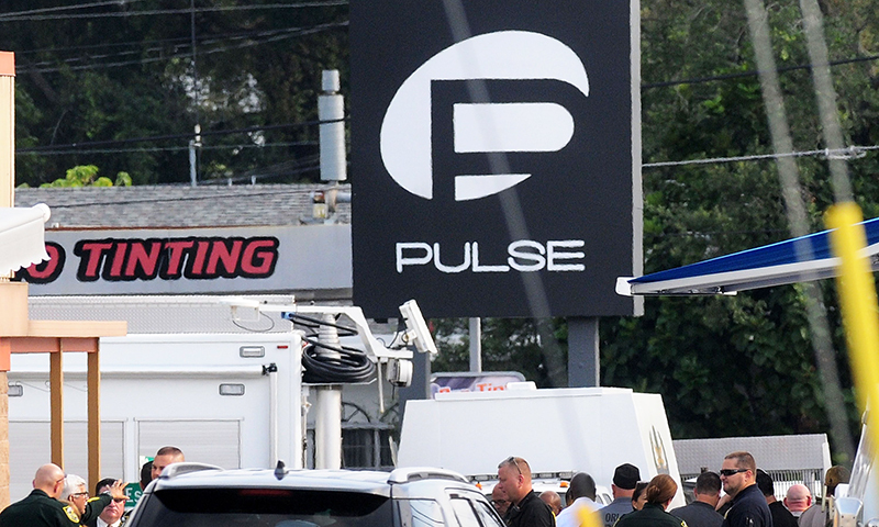 Orlando police officers seen outside of Pulse nightclub after a fatal shooting and hostage situation. -AFP