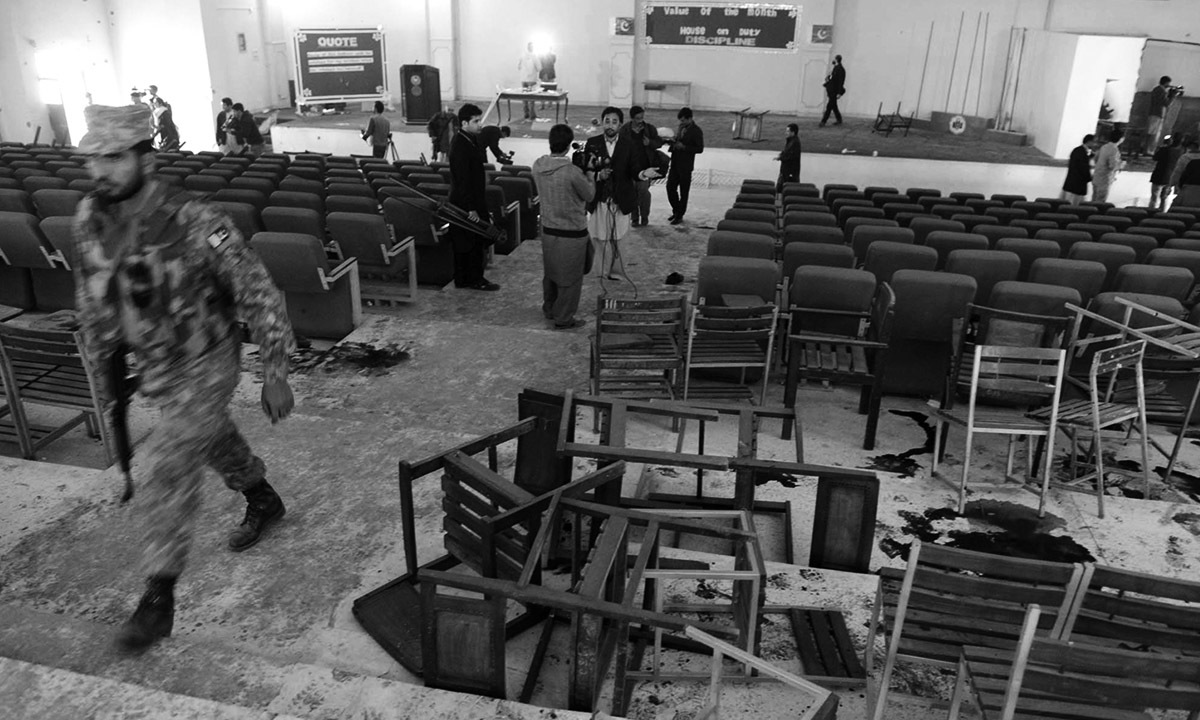 Journalists gather in the auditorium of the Army Public School in Peshawar after the massacre on 16 December, 2014 | Abdul Majeed Goraya, White Star