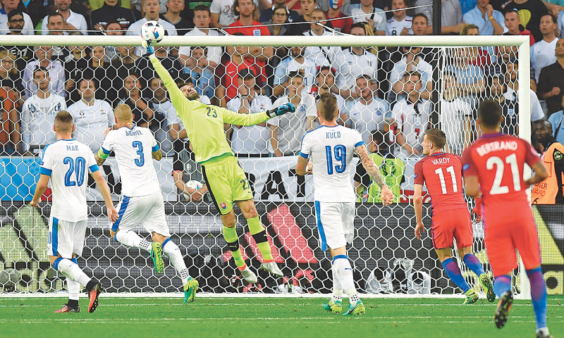 ST-ETIENNE: Slovakia&rsquo;s goalkeeper Matus Kozacik jumps to make a save during the Group &lsquo;B&rsquo; match against England at the Geoffroy-Guichard stadium.&mdash;AFP