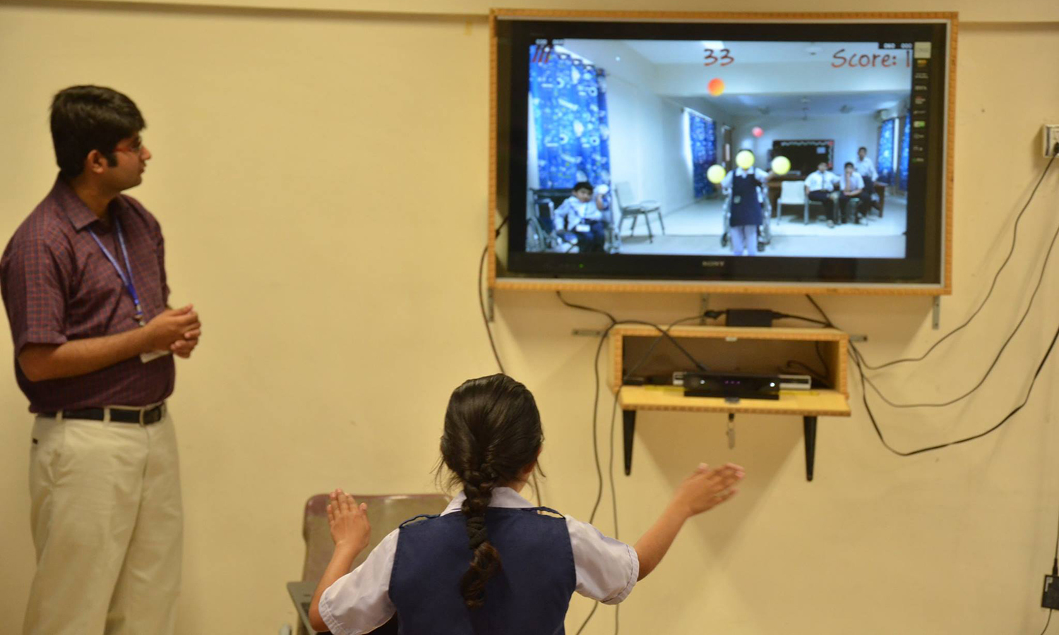 A special needs girl enjoys WonderTree at her school