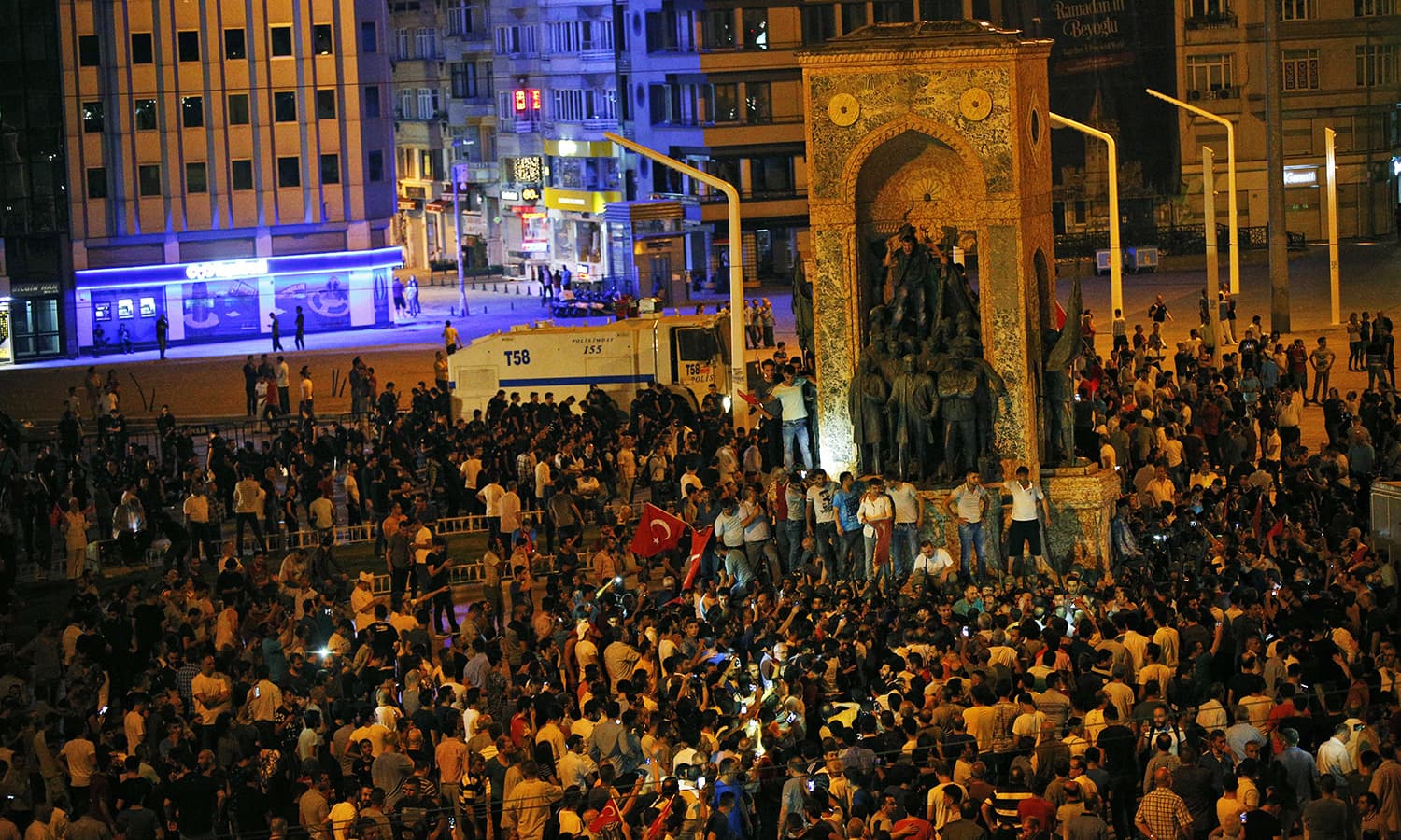 Supporters of Turkey's President Recep Tayyip Erdogan, protest in Istanbul's Taksim square, early Saturday, July 16. — AP