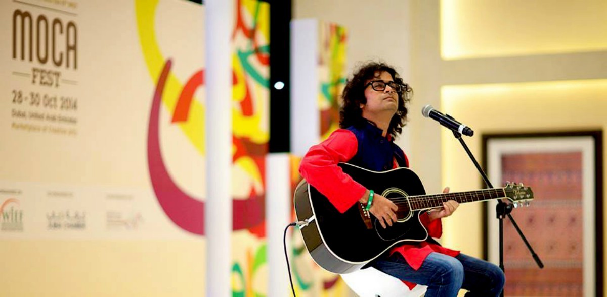 Asif Sinan, who handles the Dream Street School's music curriculum, performs at the MOCA Fest in Dubai