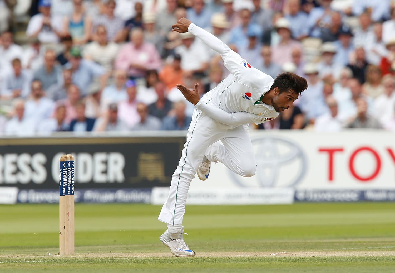 Pakistan's Mohammad Amir completes his run-up. — AFP