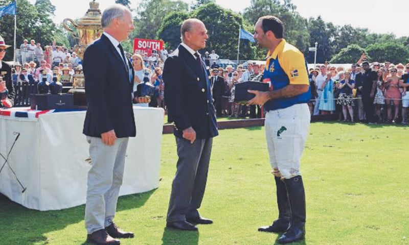 LONDON: His Royal Highness, Prince Philip presents the Coronation Cup to Pakistan&rsquo;s Hissam Ali Hyder.