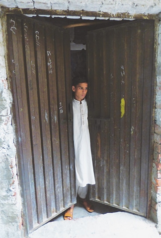 THOUGH fortunate enough to be rescued in a police raid days after he was sold as cheap labour, Khalil Ahmad still battles to come to terms with his daily life.&mdash;Tariq Mahmood / White Star